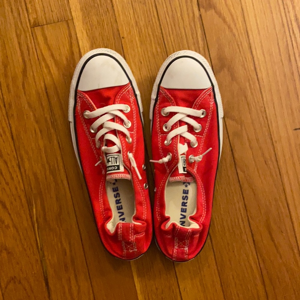 Red converse with stretchy back. Slip on.